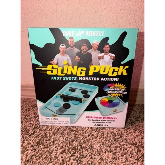 Dude Perfect Other - Dude Perfect Sling Puck Game 2-in-1 Checkers Wheel of Consequences Teal Black